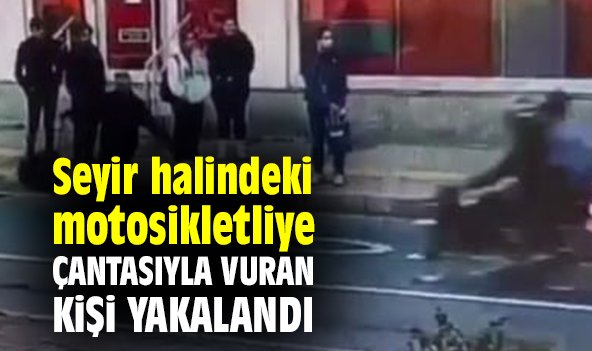 Seyir halindeki motosikletliye çantasıyla vuran kişi yakalandı